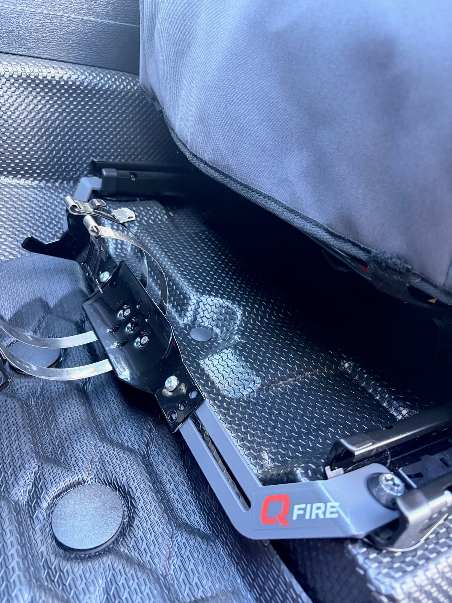 QFIRE Vehicle Fire Extinguisher Bracket - MY24+ MITSUBISHI Triton